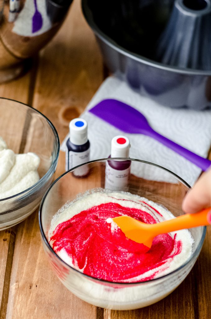 red cake batter in a bowl