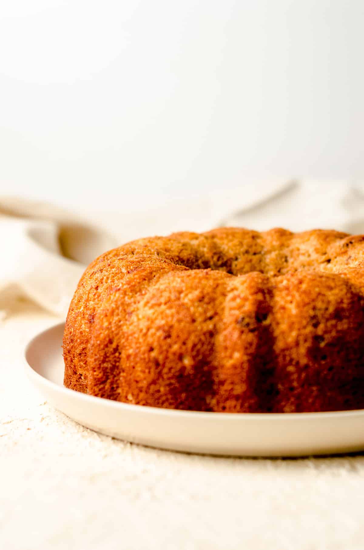 bananas foster cake on a plate