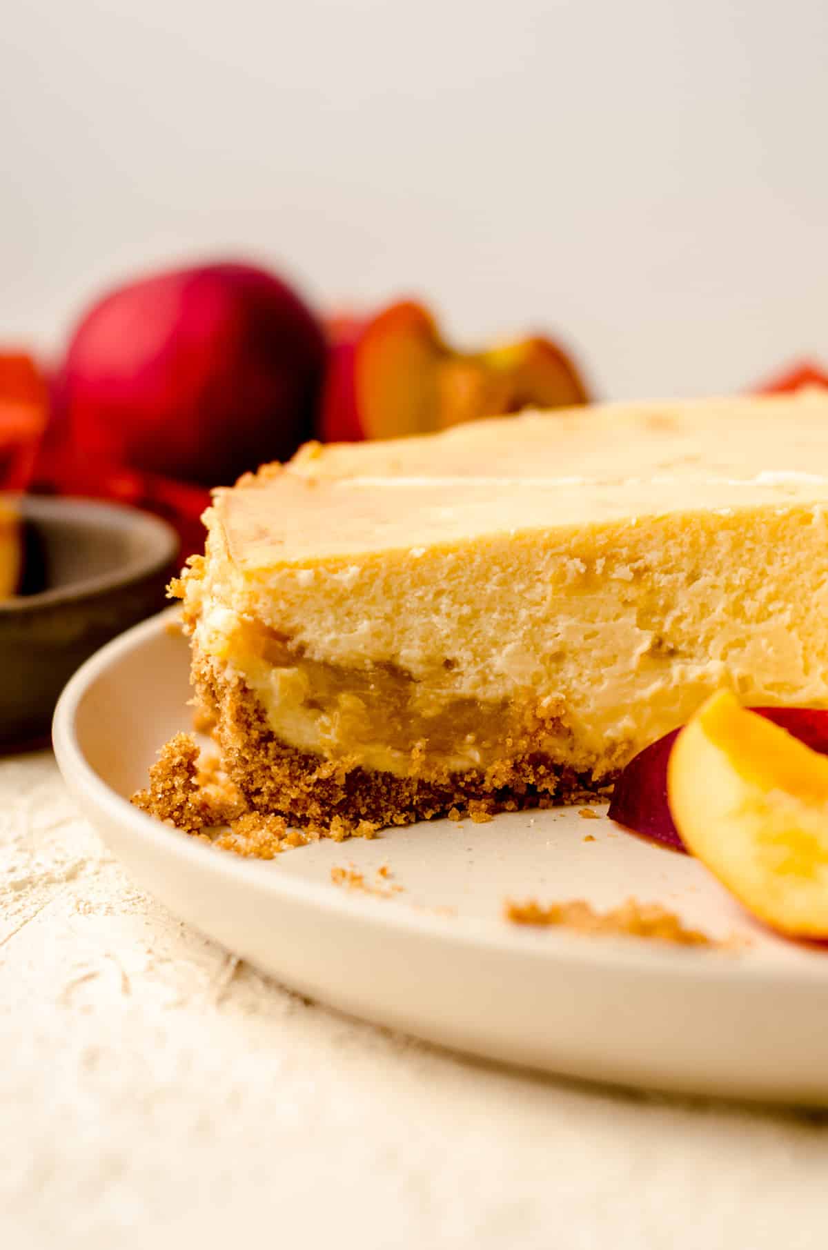 peach cheesecake on a plate