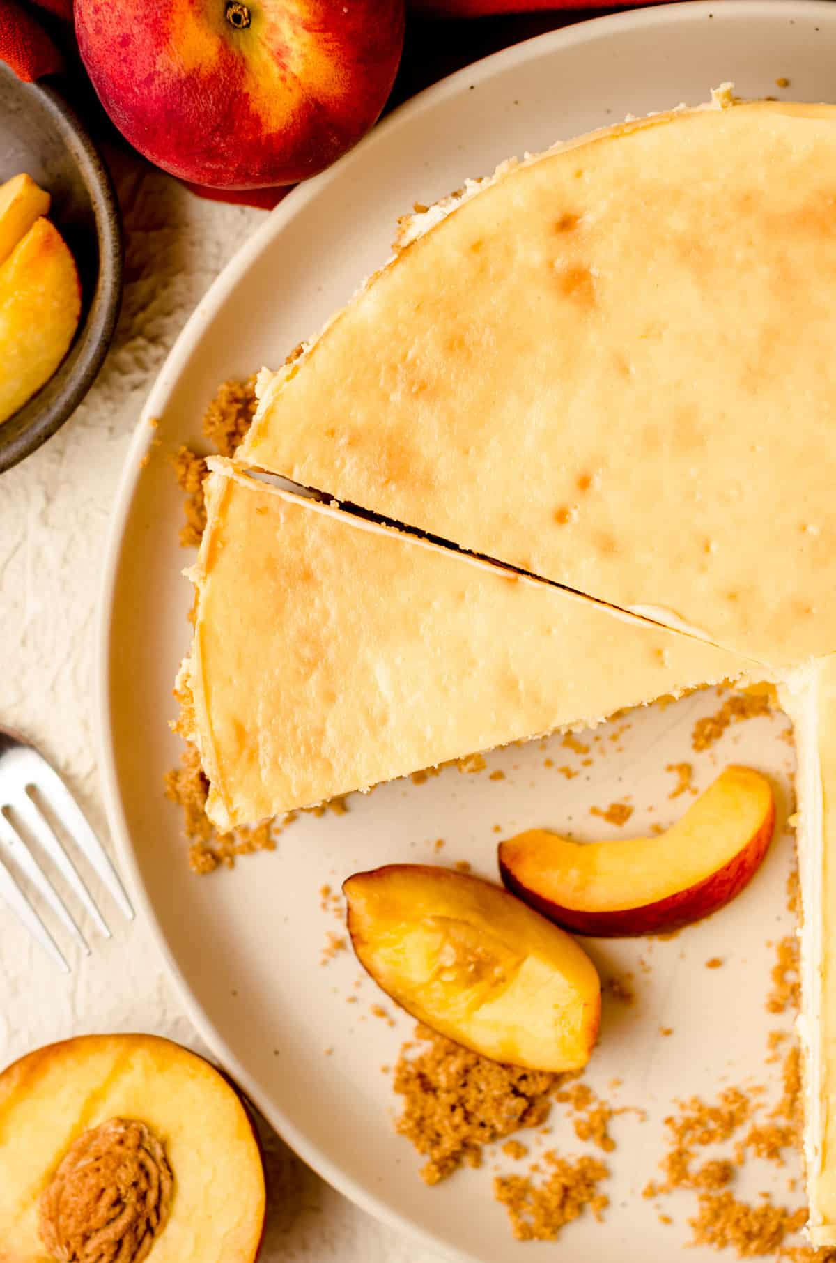 aerial photo of sliced peach cheesecake