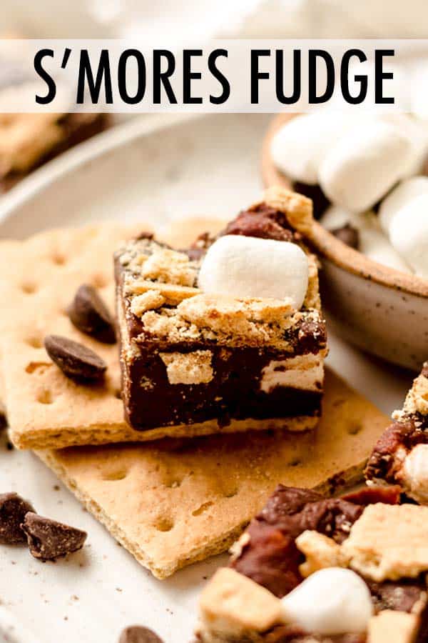 A quick and easy 4-ingredient recipe for creamy chocolate fudge filled with pieces of crunchy graham crackers and soft marshmallows. via @frshaprilflours