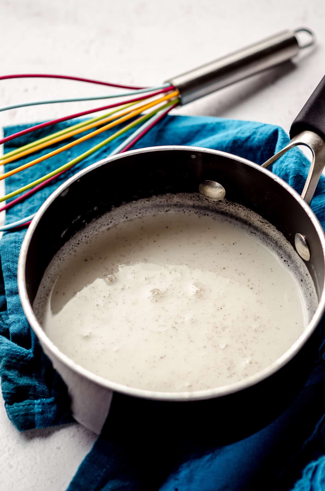 cream infused with vanilla bean for vanilla bean cupcakes