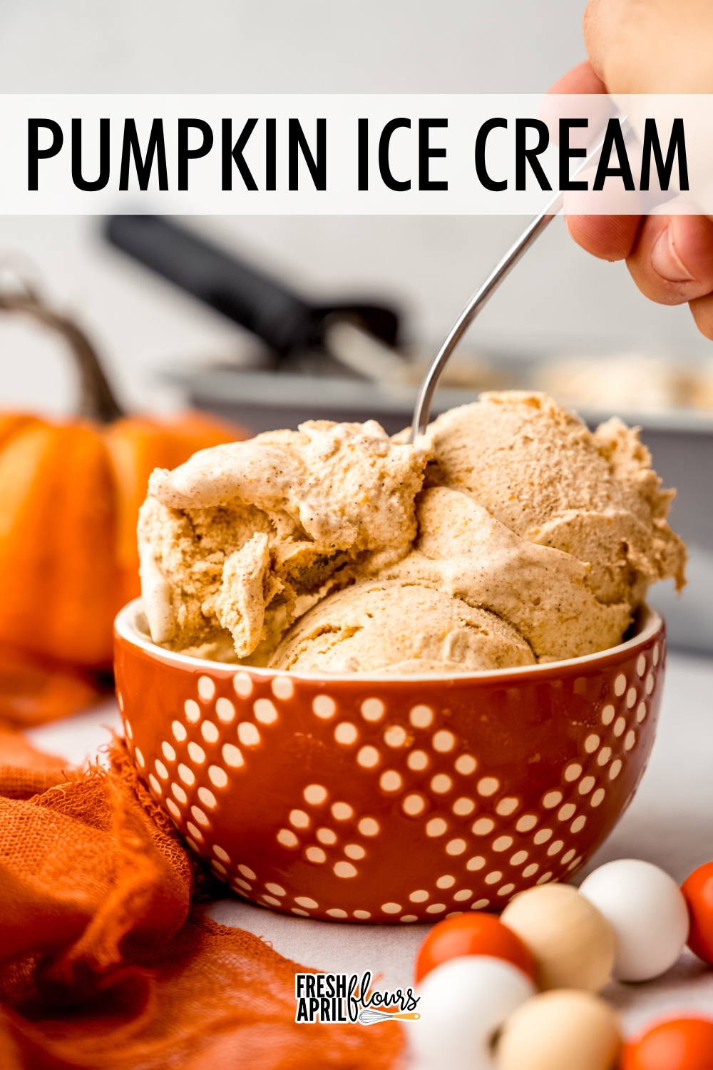 Smooth and creamy homemade ice cream made with real pumpkin, sweetened with brown sugar, and spiced with cinnamon and pumpkin pie spice. Get your pumpkin ice cream fix any time of the year with this simple recipe! via @frshaprilflours