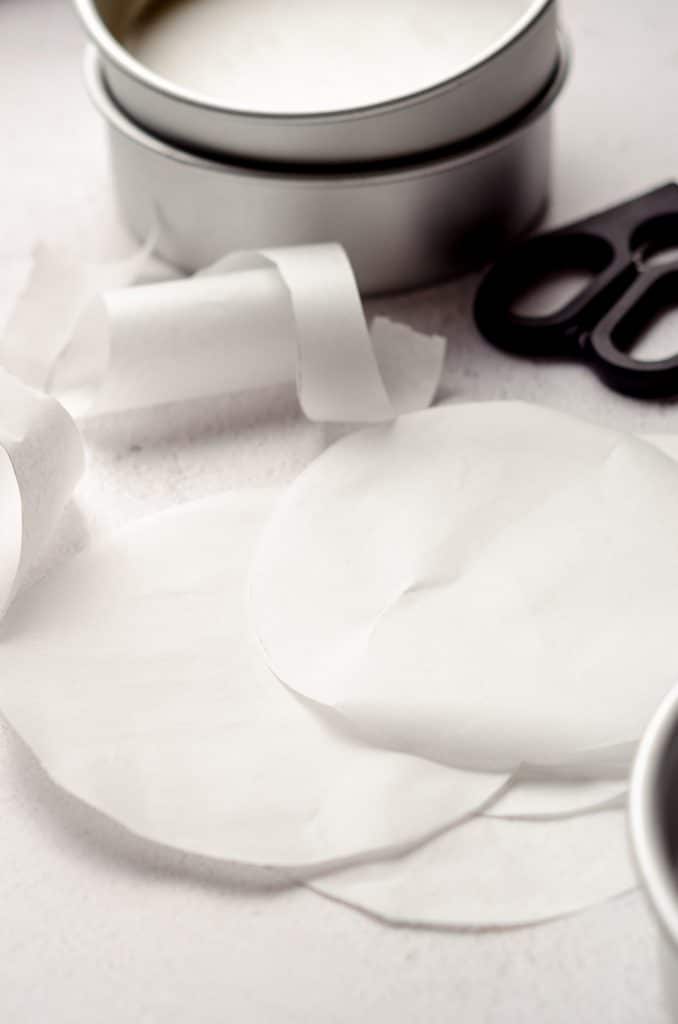 a stack of parchment rounds for cake baking