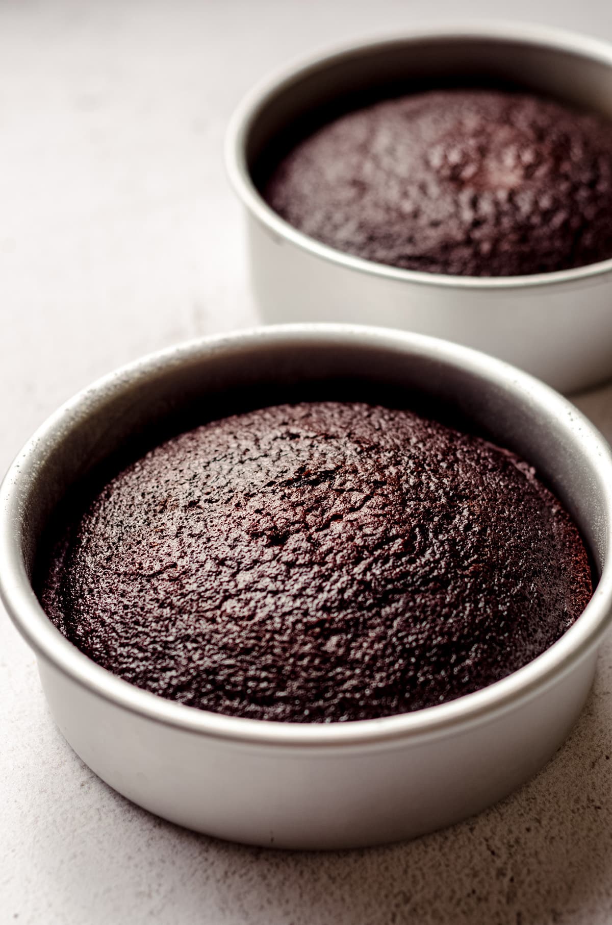 chocolate cake layers baked in pans