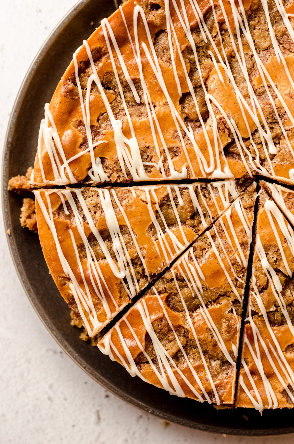 aerial photo of sliced cinnamon roll cheesecake