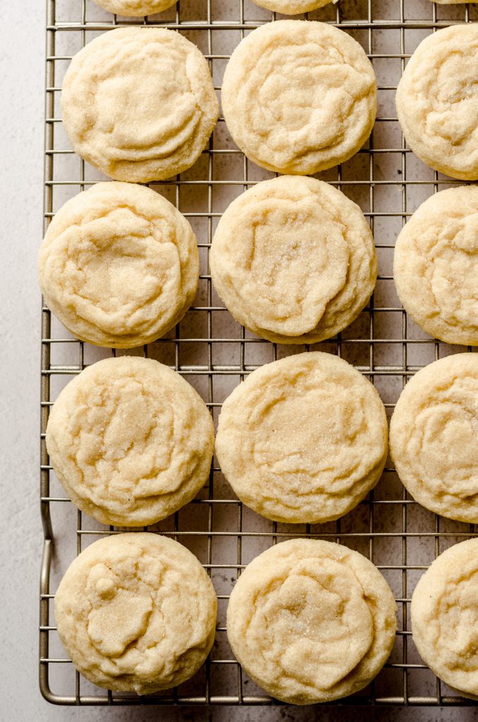 aerial photo of vanilla bean sugar cookies on a cooling rack