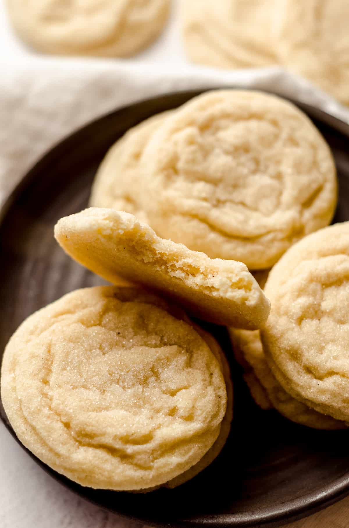 vanilla bean sugar cookie with a bite taken out of it