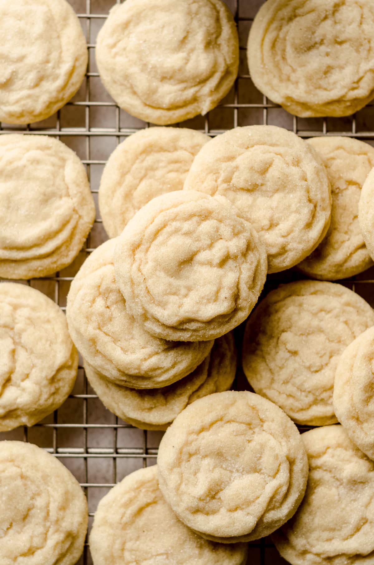 aerial photo of vanilla bean sugar cookies on a cooling rack