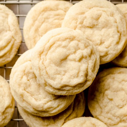 aerial photo of vanilla bean sugar cookies on a cooling rack