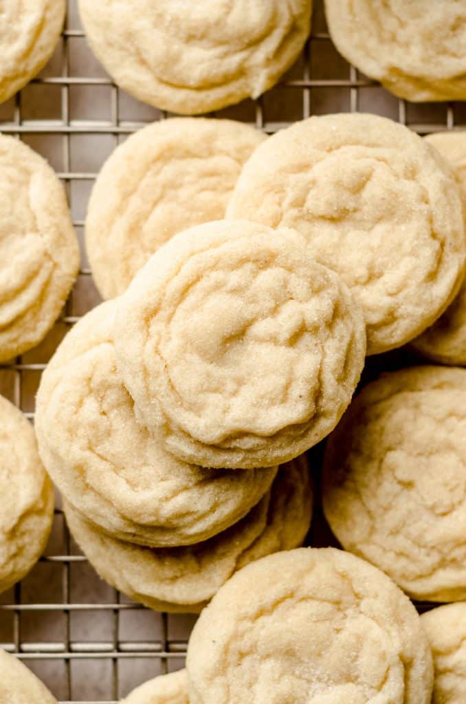 aerial photo of vanilla bean sugar cookies on a cooling rack