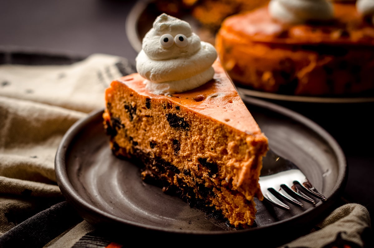 slice of halloween cheesecake on a plate