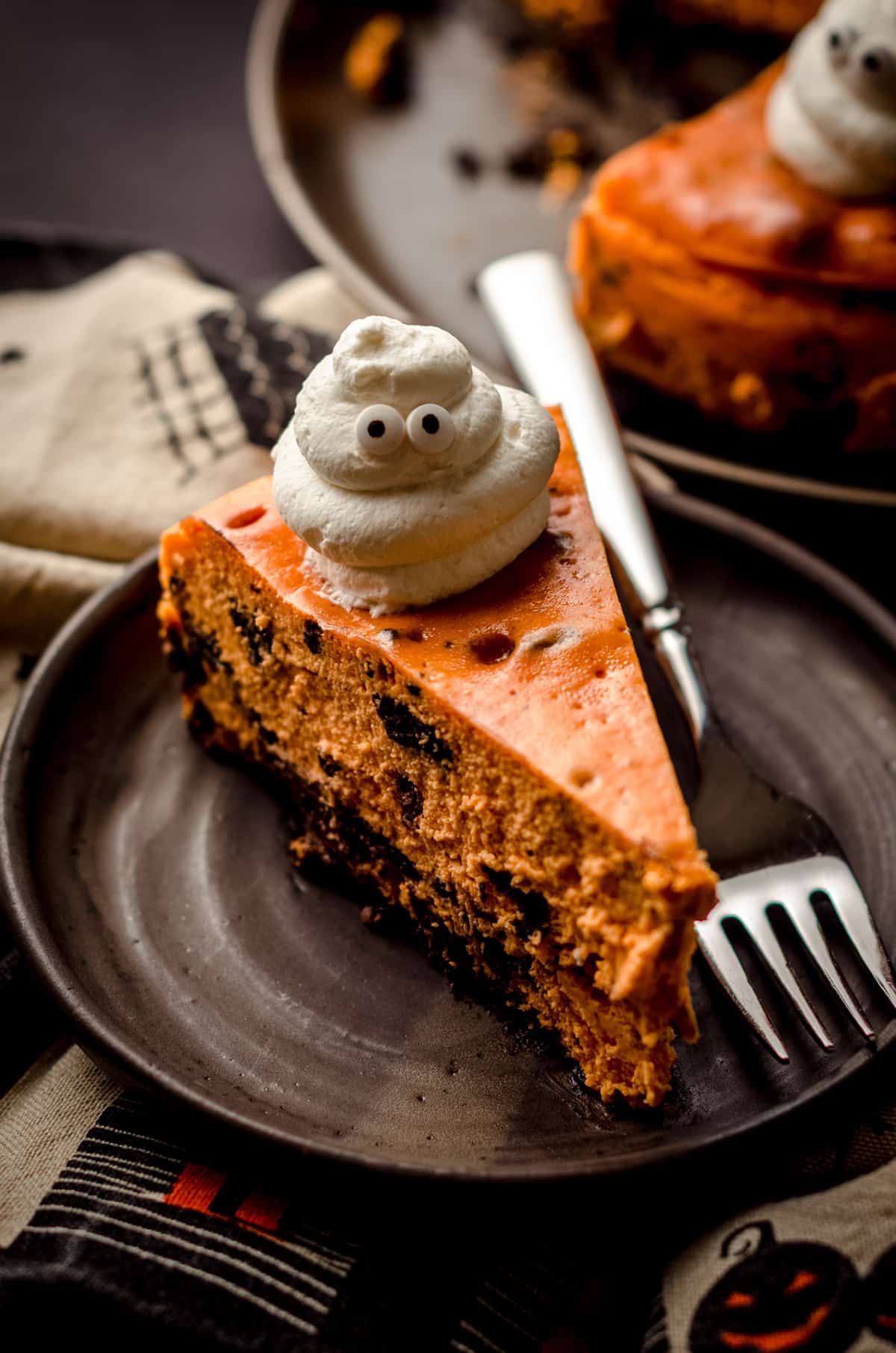 slice of halloween cheesecake on a plate