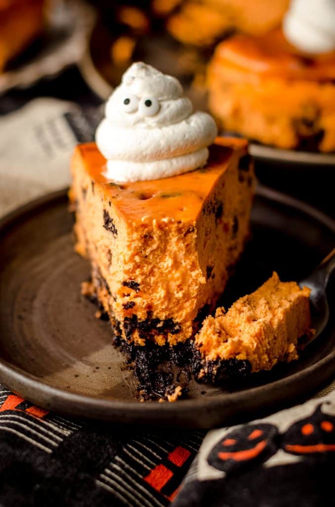 halloween cheesecake with a bite taken out of it