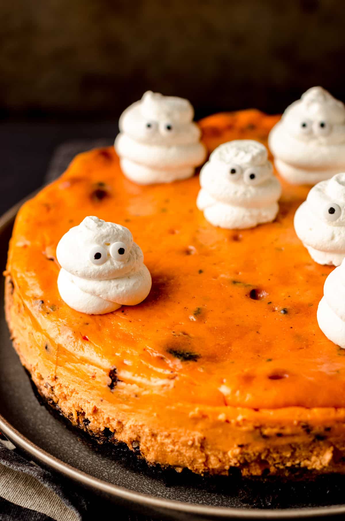 halloween cheesecake with whipped cream ghosts