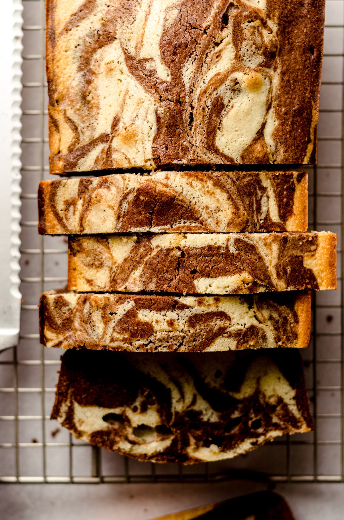 aerial photo of sliced loaf of chocolate and vanilla marbled pound cake