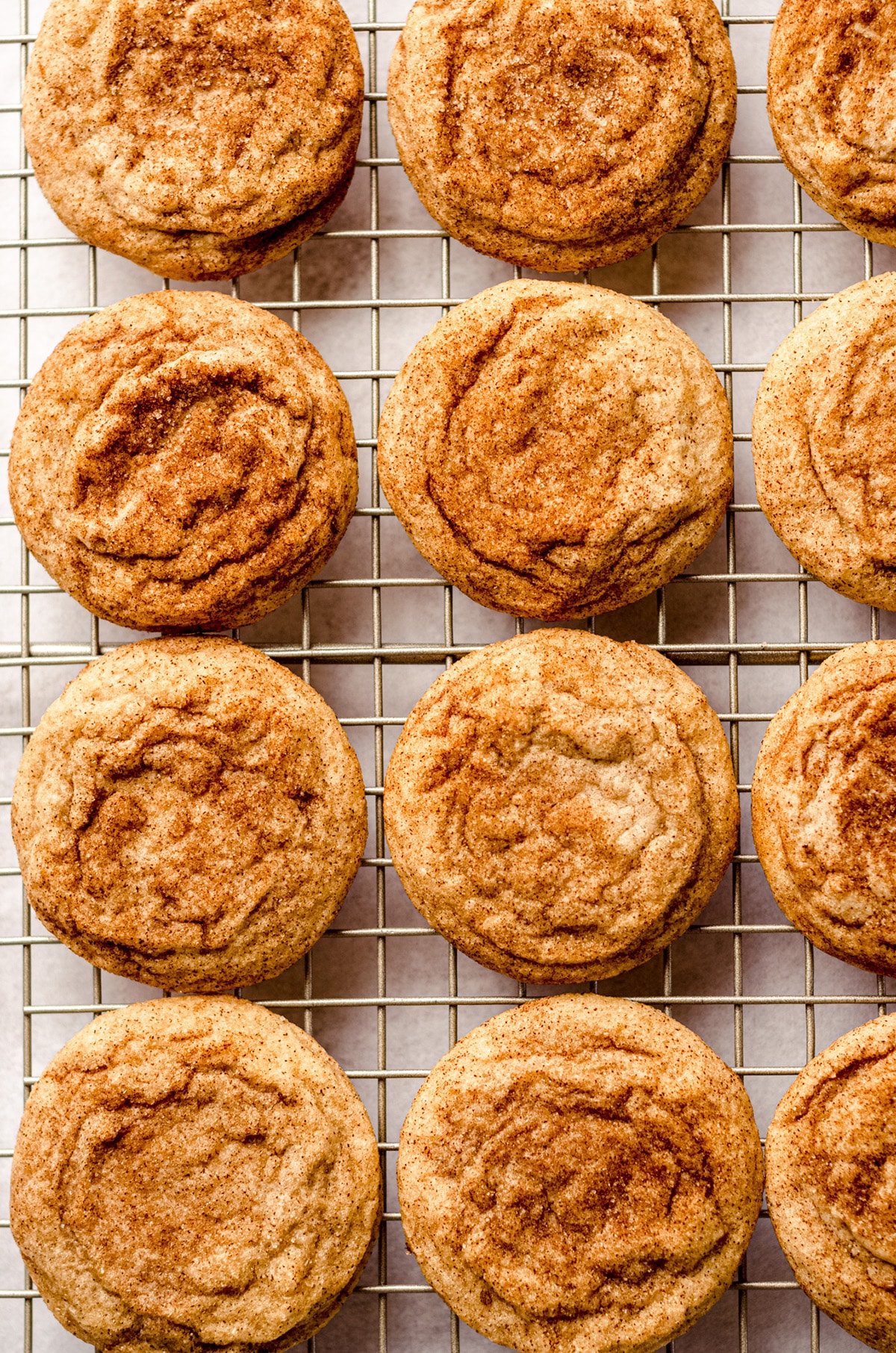 snickerdoodle cookies on a cooling rack