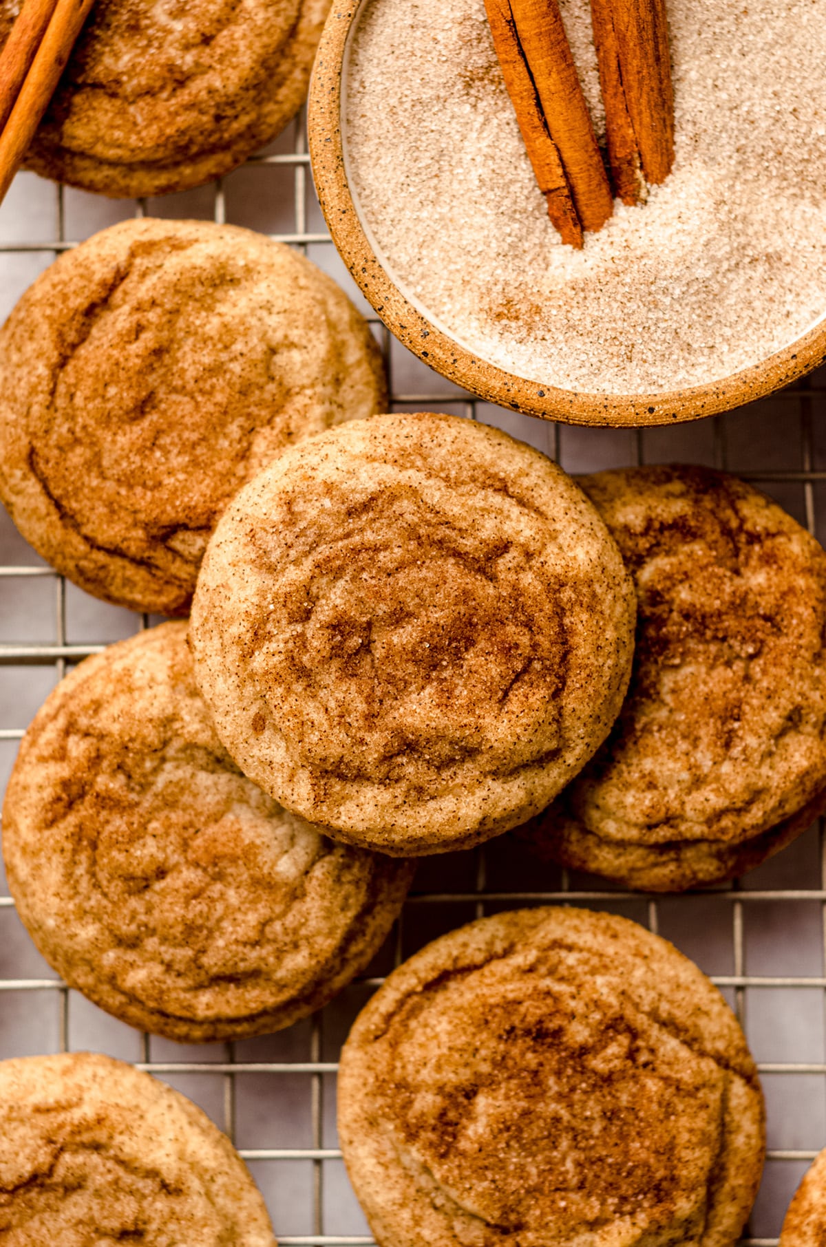 snickerdoodle cookies on a cooling rack