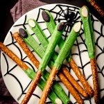 aerial photo of witch finger pretzels on a spider web plate