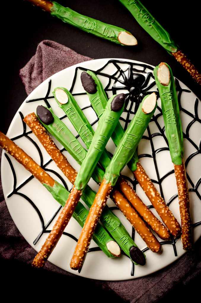 aerial photo of witch finger pretzels on a spider web plate