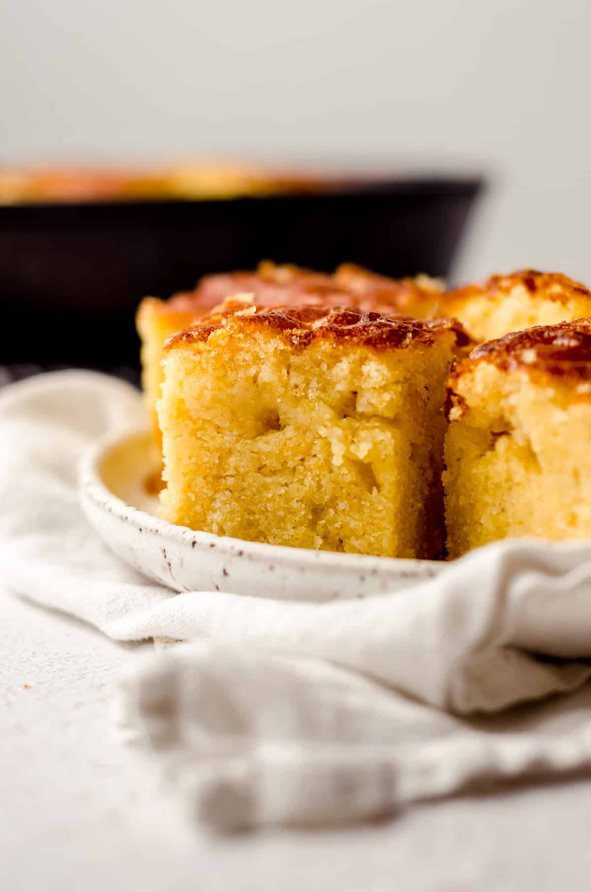 slices of homemade skillet cornbread on a plate