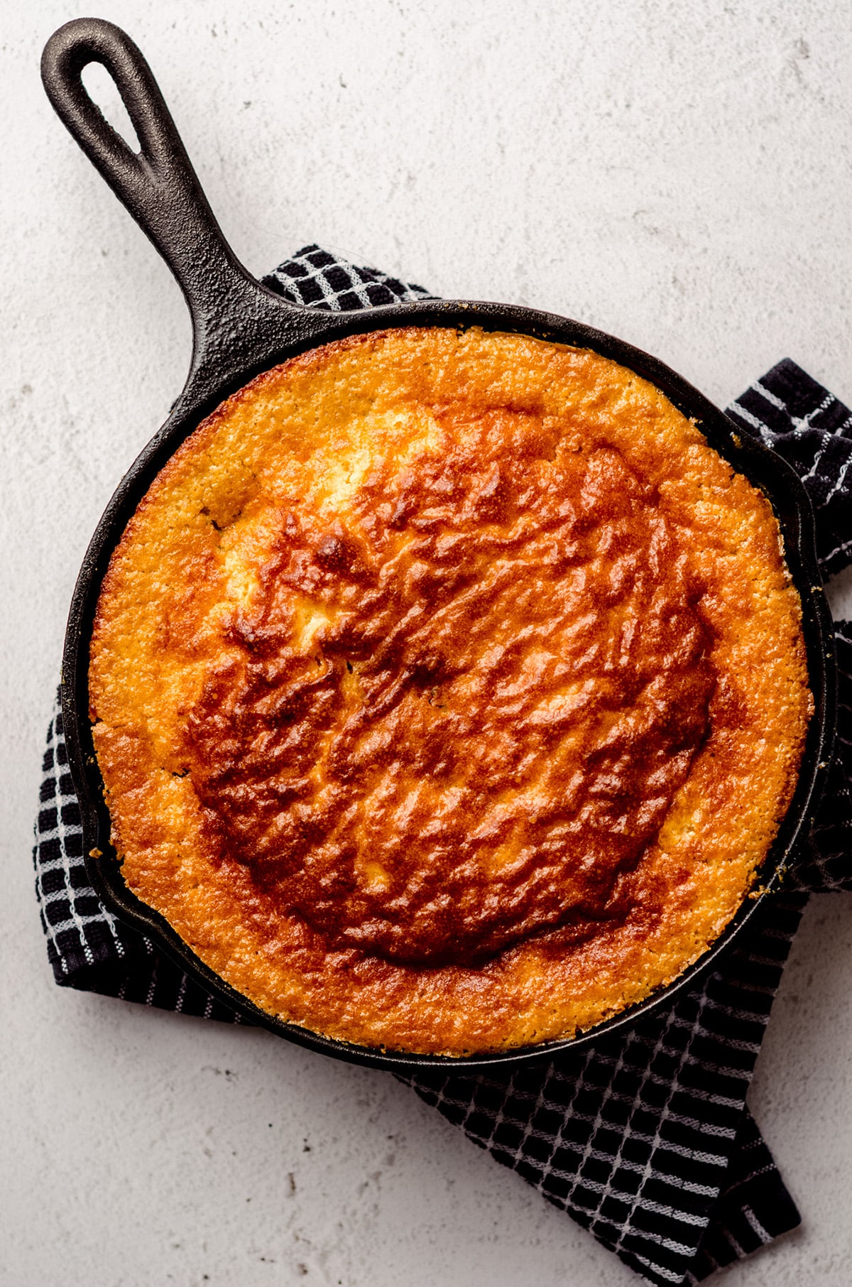 aerial photo of homemade cornbread baked in a sillet