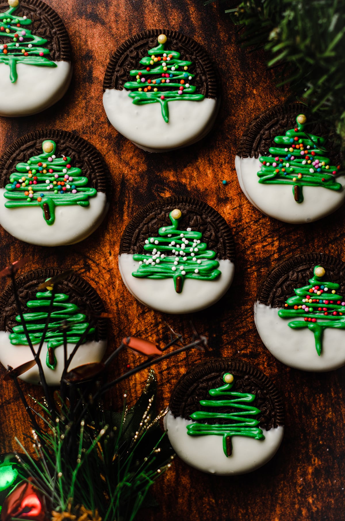 christmas oreos on a surface with festive decor