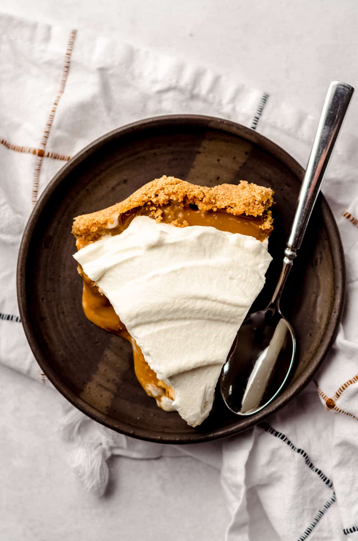 aerial photo of banoffee pie on a plate with a fork