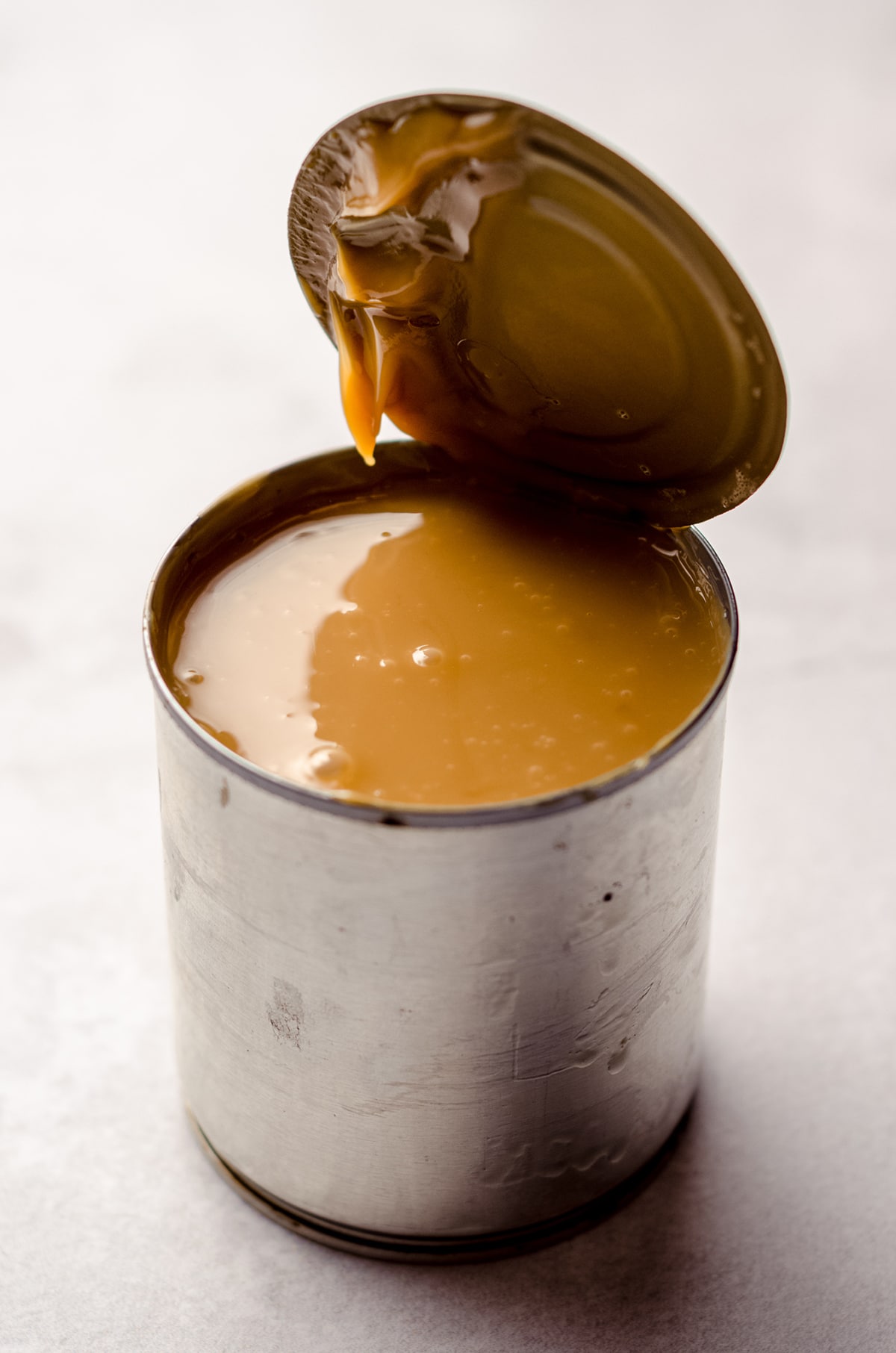 can of sweetened condensed milk made into homemade dulce de leche