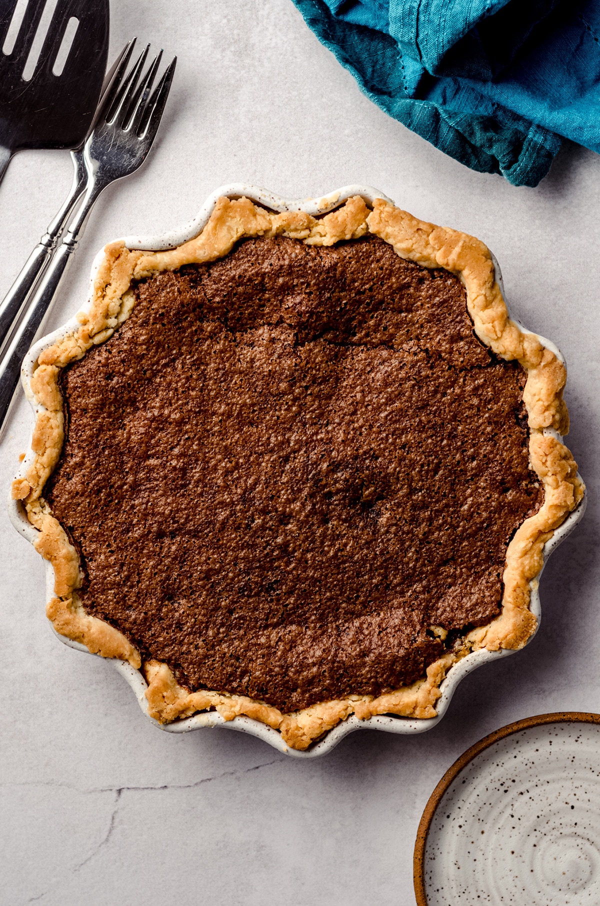 aerial photo of chocolate chess pie in a pie plate