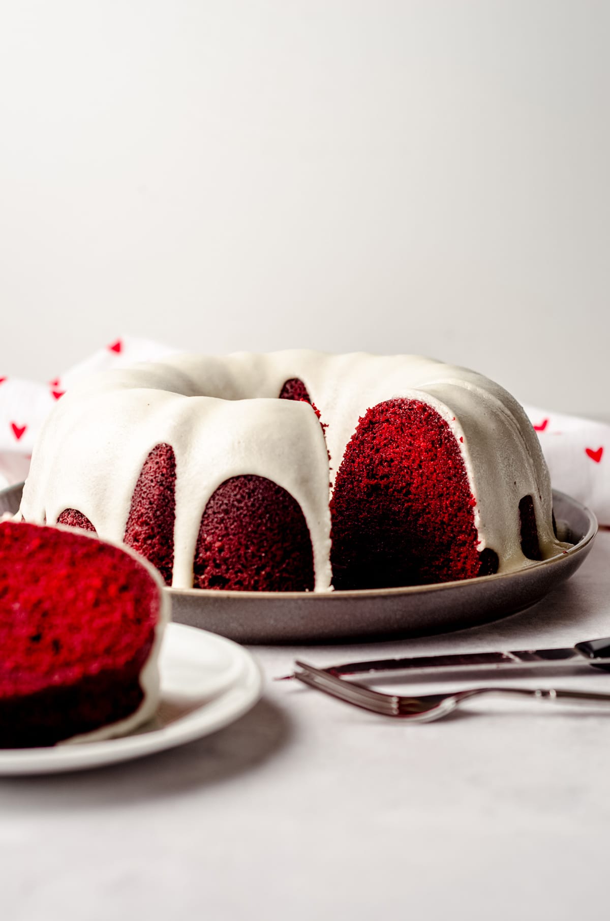 sliced red velvet bundt cake on a plate