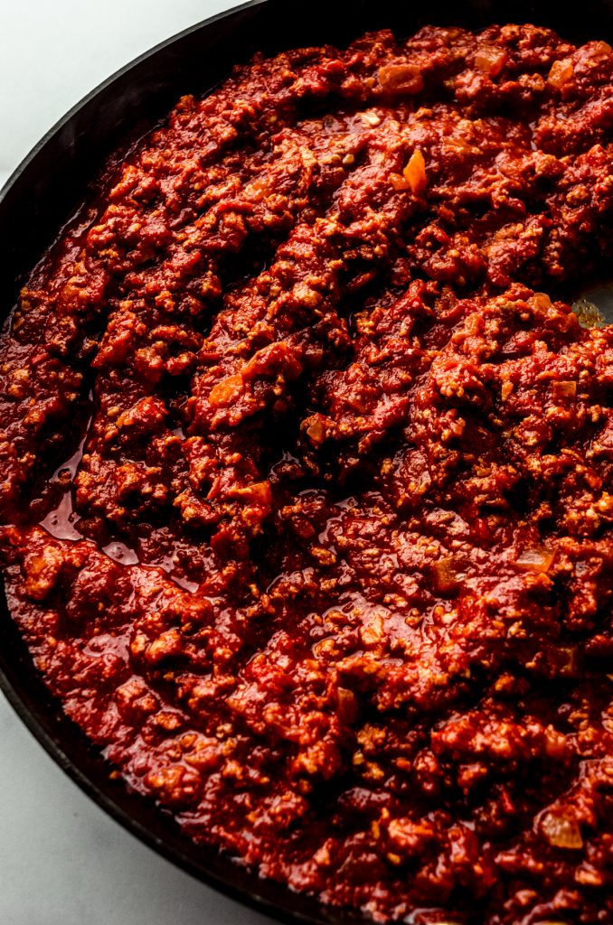 Homemade meat sauce in a saucepan.