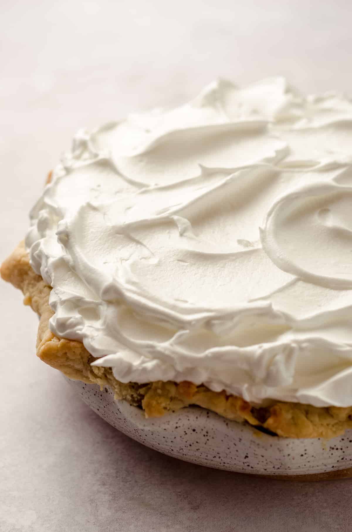 A pie topped with meringue.