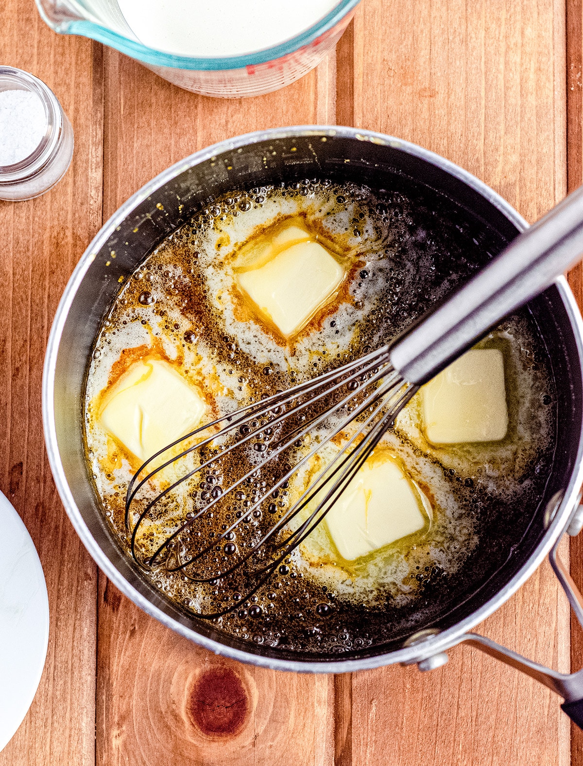 aerial photo of slices of butter in homemade caramel sauce