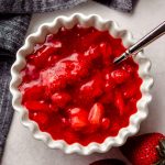 aerial photo of strawberry sauce in a bowl