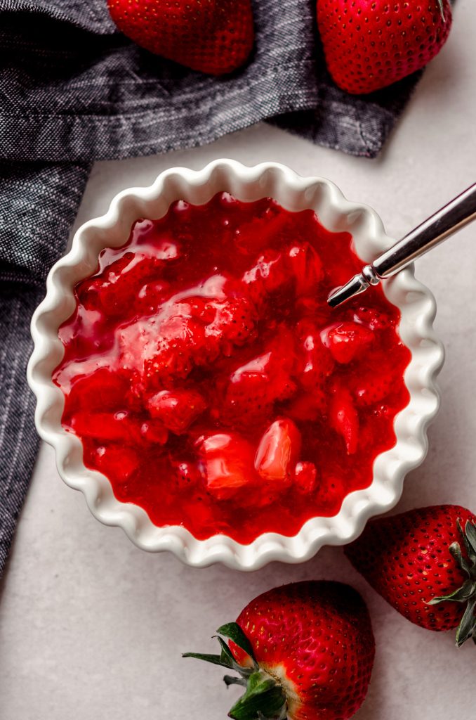 aerial photo of strawberry sauce in a bowl