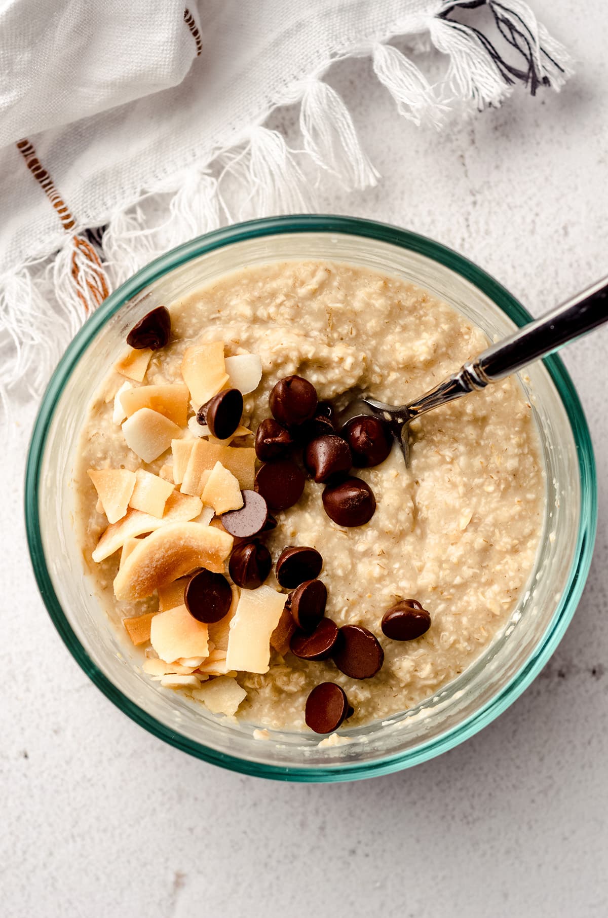 A bowl of oatmeal with toppings included.