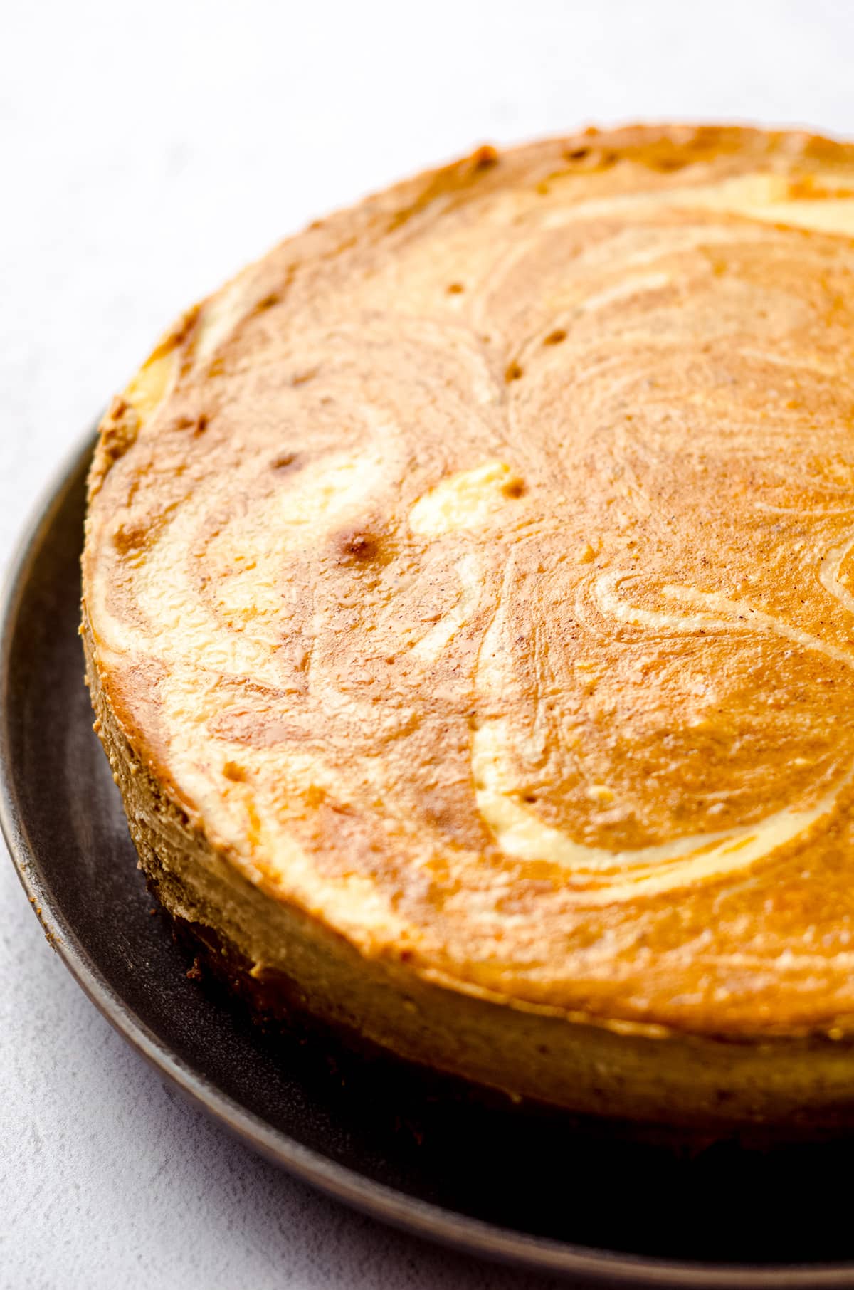 A plain pumpkin swirl cheesecake.
