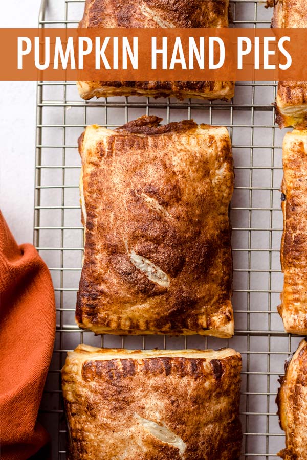 Simple handheld pies stuffed with a spiced pumpkin filling and made with pre-made puff pastry for an easy assembly and even easier eating! via @frshaprilflours