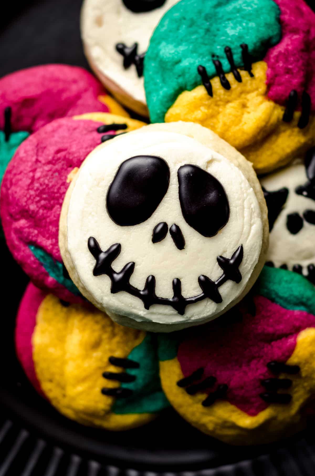 jack skellington cookies on a plate with sally stitches cookies