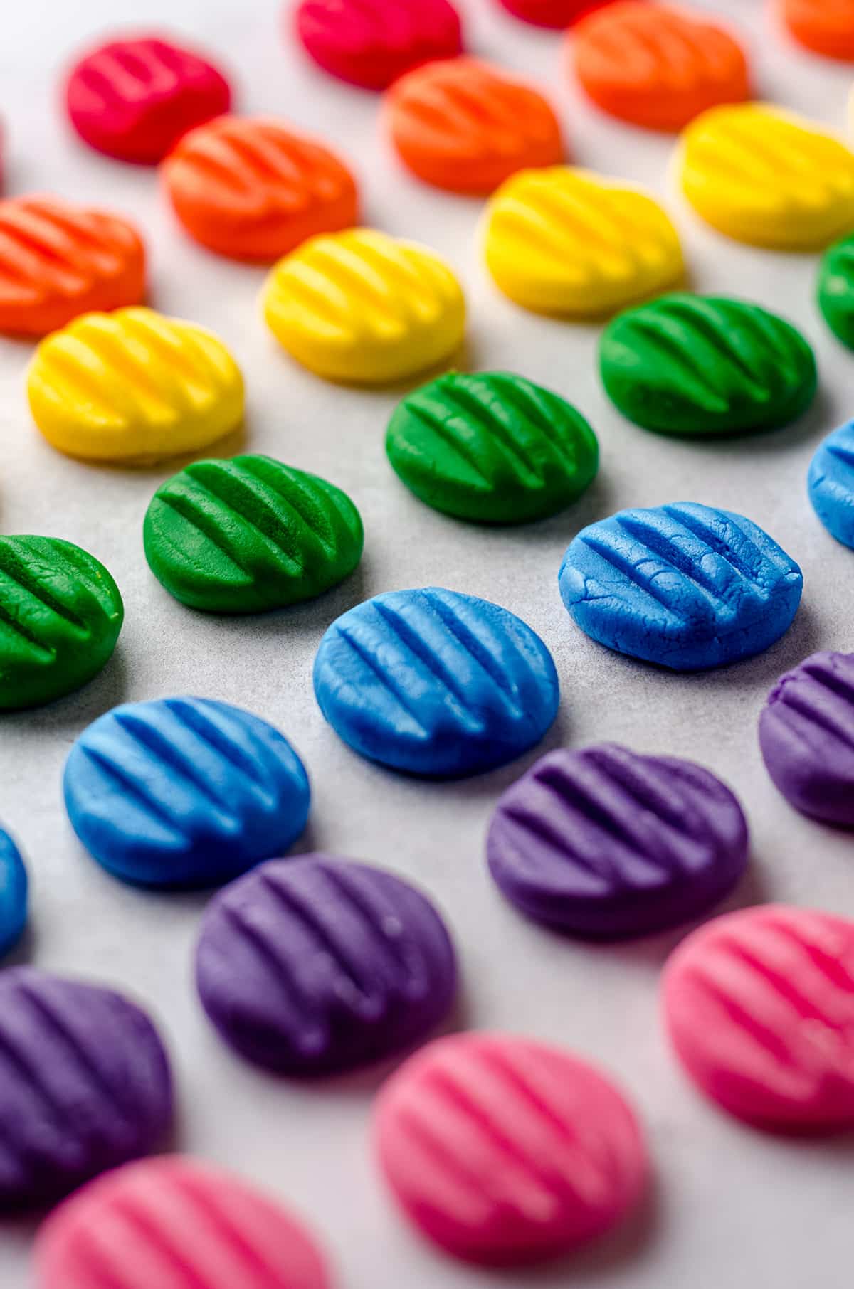 Rows of colored cream cheese mints.