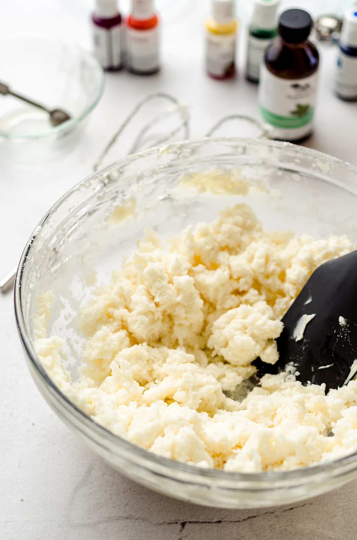 Mixing together a cream cheese dough.