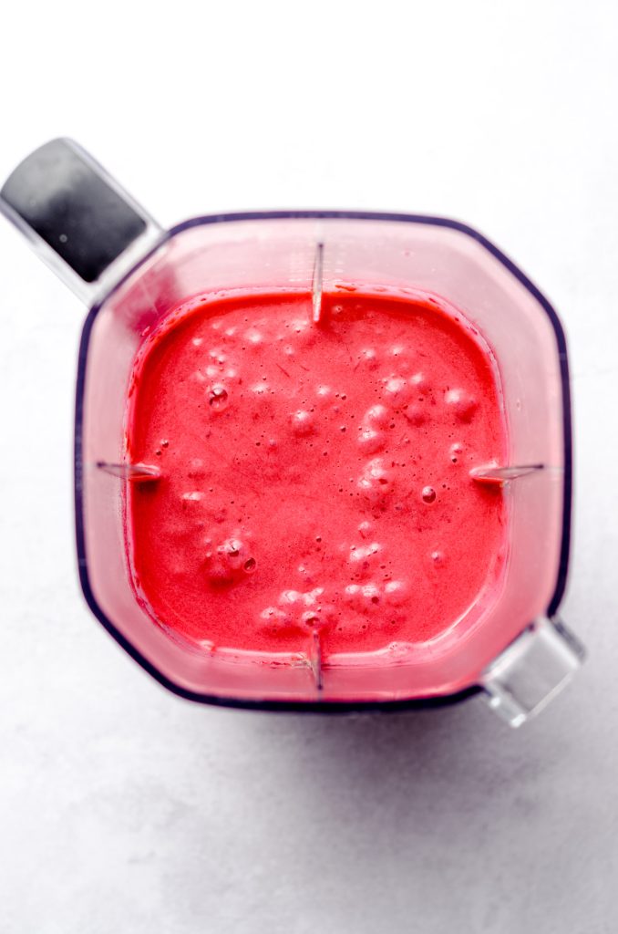 aerial photo cranberry curd mixture in a blender