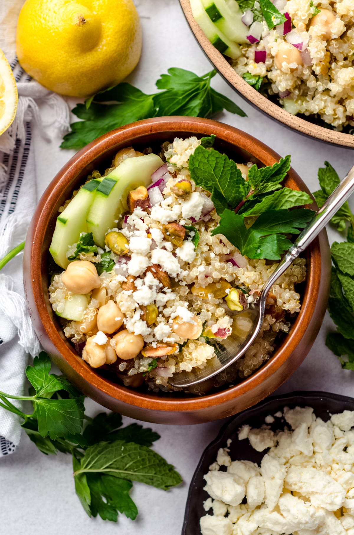 bowl of jennifer aniston salad in a bowl with a spoon