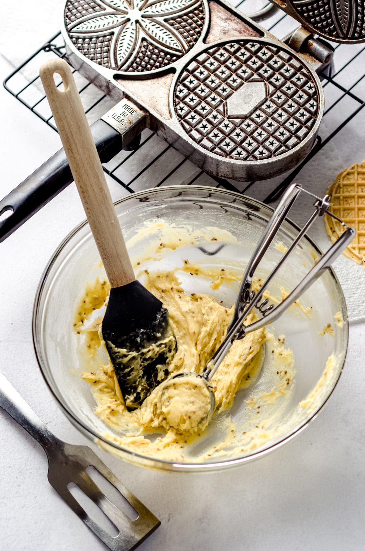 Using a cookie scoop to portion cookie dough.