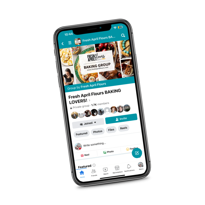 An iPhone frame with a picture of a Facebook group on it. The Facebook group is a baking group.