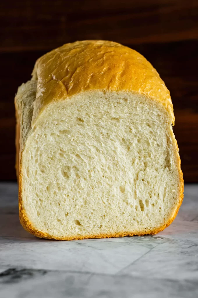 A loaf of sourdough bread made in a bread machine.