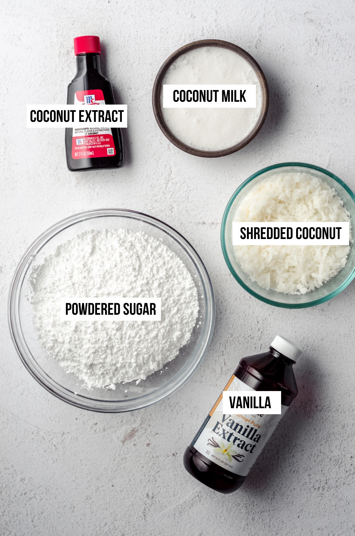 ingredients needed for coconut icing laid out on a counter. 