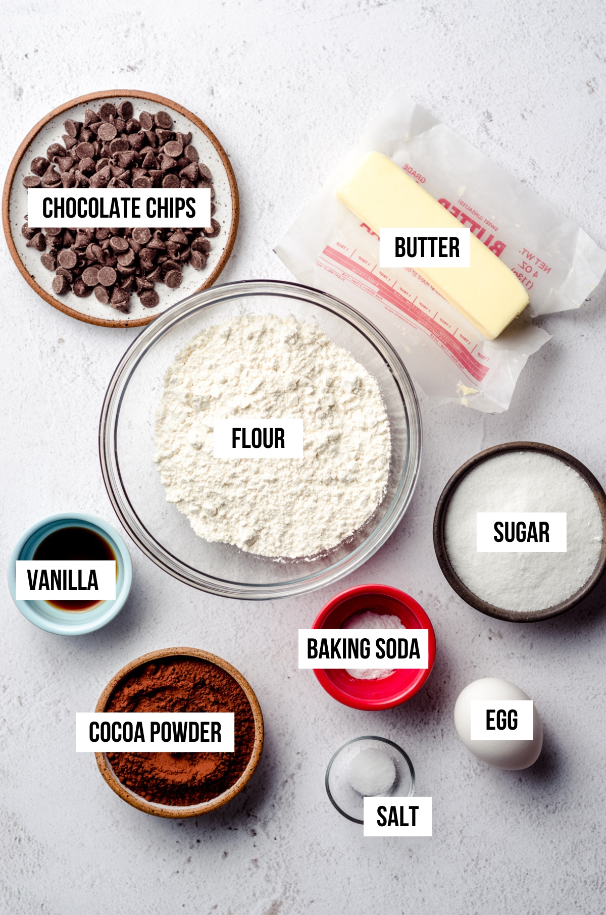 ingredients for chocolate chocolate chip cookies with ingredient label text overlay.