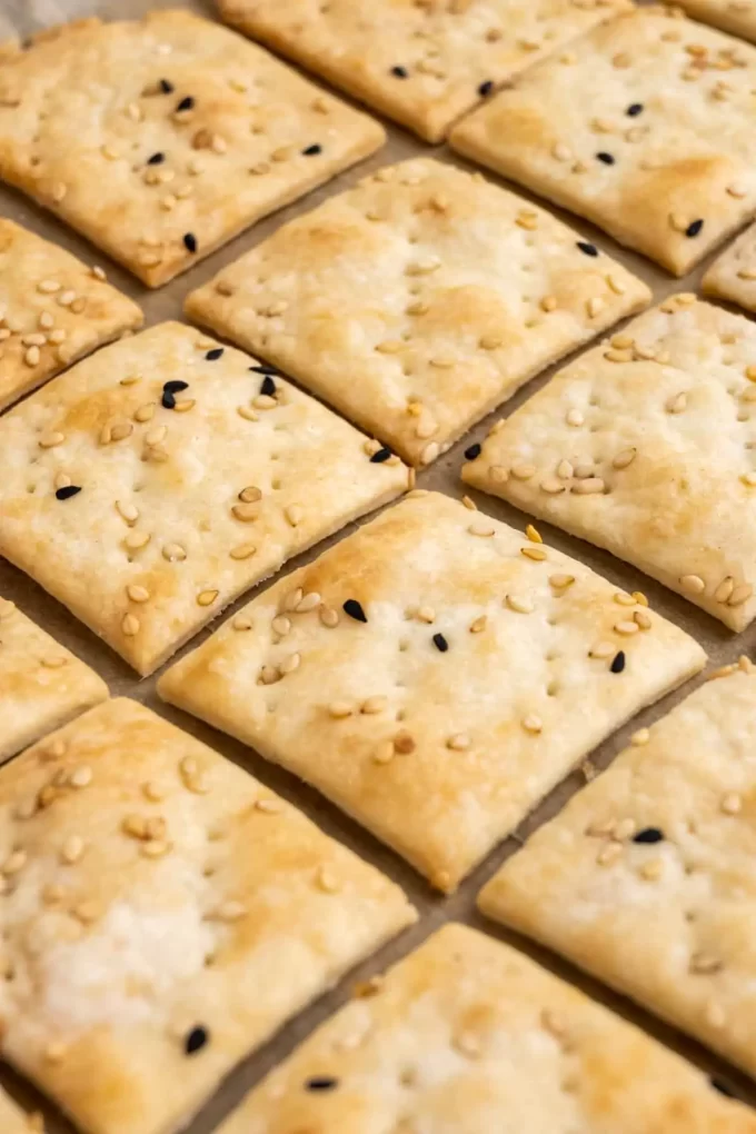 Sourdough crackers sliced into squares.